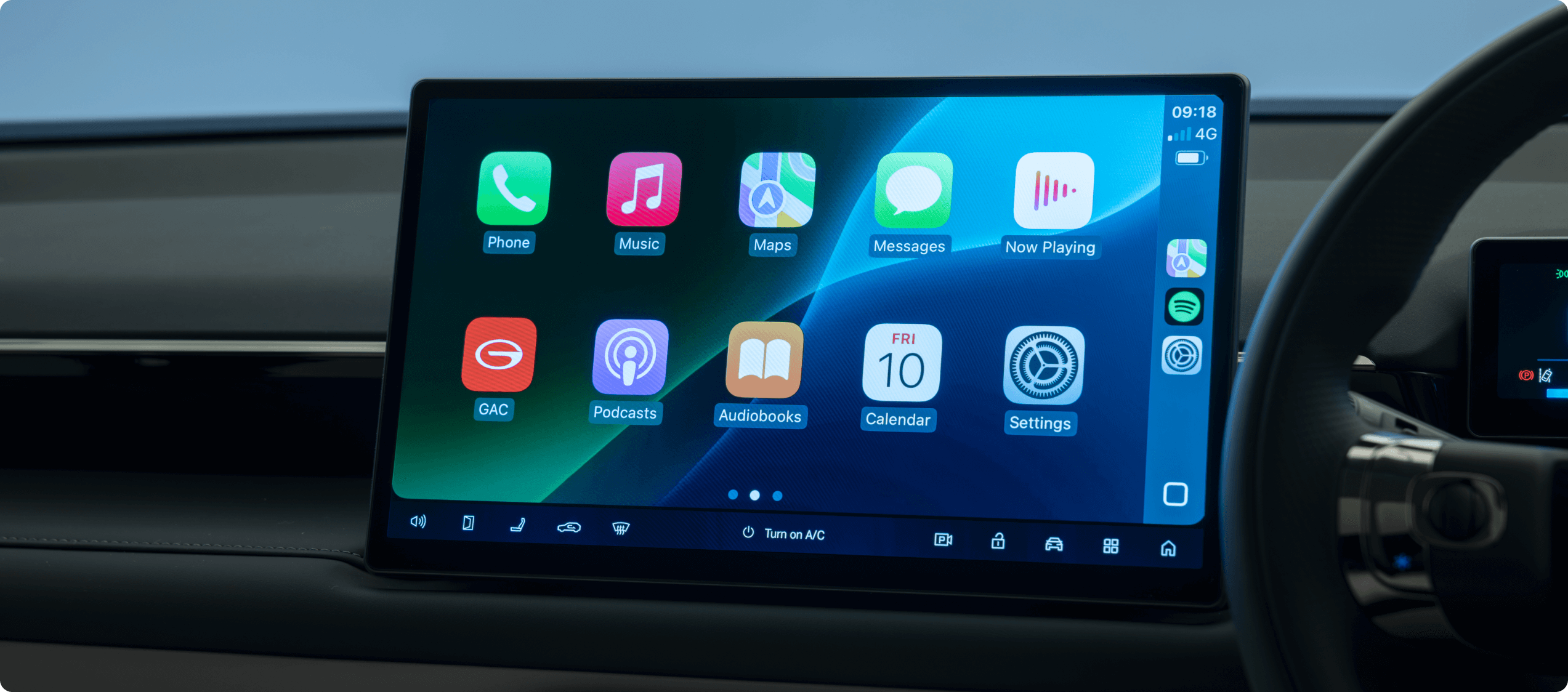 AION V infotainment touchscreen showing navigation, media and vehicle apps