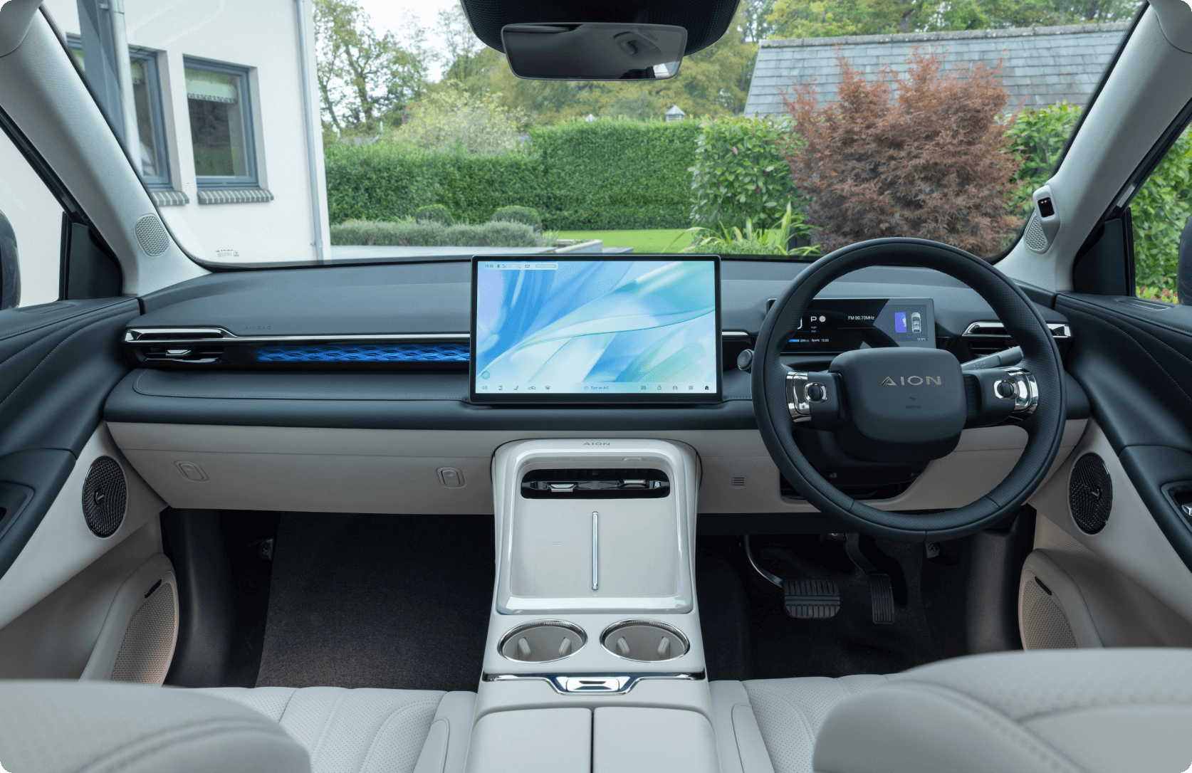 AION interior showing digital dashboard, central touchscreen and centre console