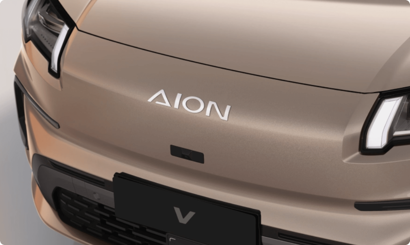 Close-up of the AION badge on the front of the AION V