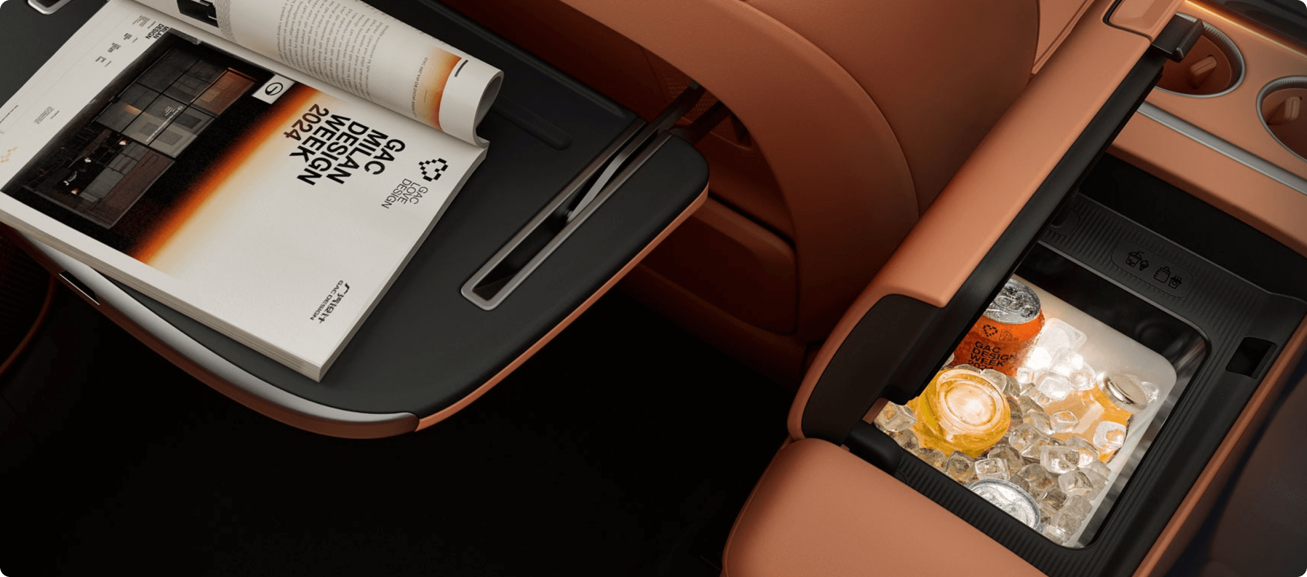 Premium car interior with tan leather seats, rear centre console storage and fold-down table