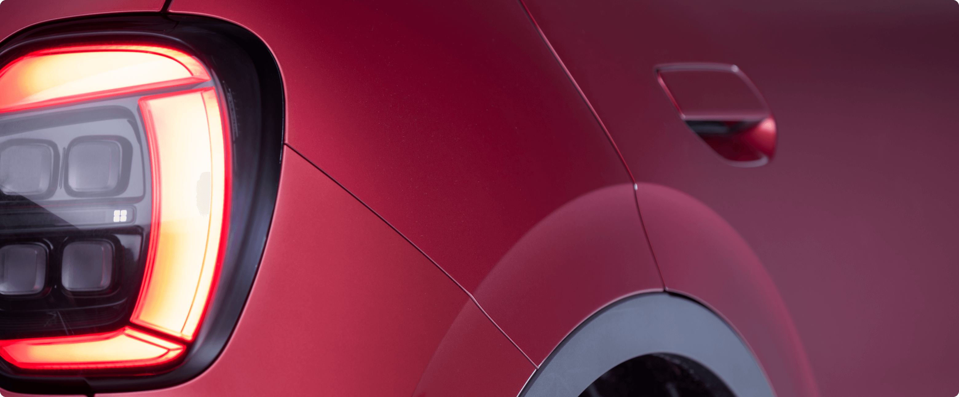 Close-up of the AION UT rear light and body panel detail