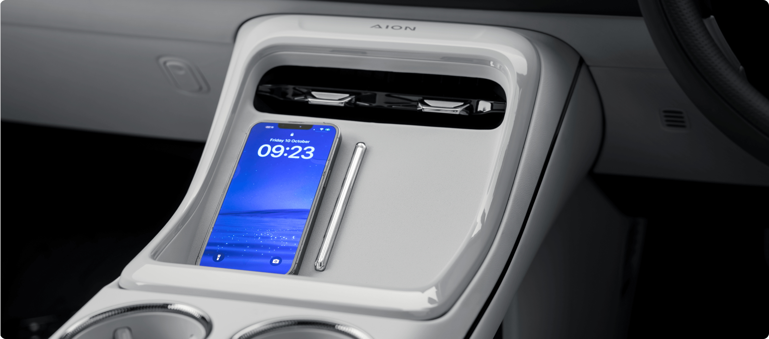 AION V centre console with wireless smartphone charging tray and front storage area