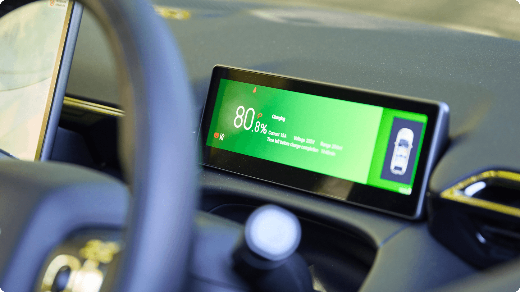 AION digital driver display showing battery charge status and charging progress