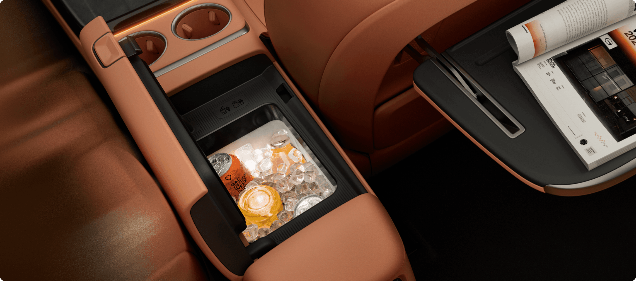 AION V centre console with integrated cooled storage compartment holding drinks and ice